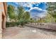 Serene backyard featuring pavers, stone accents, and mature landscaping, perfect for relaxing and entertaining outdoors at 5201 Progresso St, Las Vegas, NV 89135