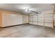 This garage features built-in storage cabinets and an automatic garage door at 5201 Progresso St, Las Vegas, NV 89135