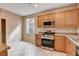 Charming kitchen with stainless steel appliances and bright natural light at 5201 Progresso St, Las Vegas, NV 89135