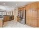 Modern kitchen with stainless steel refrigerator and spacious cabinets at 5201 Progresso St, Las Vegas, NV 89135