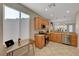 Modern kitchen with stainless steel appliances and light wood cabinets at 5201 Progresso St, Las Vegas, NV 89135