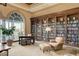 Beautiful library features floor-to-ceiling bookshelves and views of the surrounding community at 5201 Progresso St, Las Vegas, NV 89135