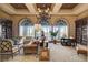 Elegant library with comfortable seating, large windows, and floor-to-ceiling bookshelves at 5201 Progresso St, Las Vegas, NV 89135