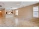 Spacious living area with neutral walls, tile floors, and ample natural light at 5201 Progresso St, Las Vegas, NV 89135