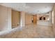 Open floor plan living area featuring tile flooring and neutral paint at 5201 Progresso St, Las Vegas, NV 89135