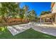 Landscaped backyard with pool and patio at 5423 San Florentine Ave, Las Vegas, NV 89141