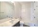 Clean bathroom with white tile and vanity at 5423 San Florentine Ave, Las Vegas, NV 89141