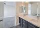 Modern bathroom with double vanity and gray cabinets at 5423 San Florentine Ave, Las Vegas, NV 89141