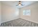 Simple bedroom with window and ceiling fan at 5423 San Florentine Ave, Las Vegas, NV 89141