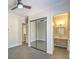 Bedroom with mirrored closet doors and en-suite bathroom at 5423 San Florentine Ave, Las Vegas, NV 89141