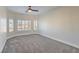 Spacious bedroom with bay window and ceiling fan at 5423 San Florentine Ave, Las Vegas, NV 89141