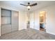 Bedroom with built-in gray closet and carpet at 5423 San Florentine Ave, Las Vegas, NV 89141