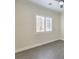 Bright bedroom with plantation shutters and tile floors at 5423 San Florentine Ave, Las Vegas, NV 89141