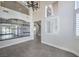 Bright dining area with large windows and modern chandelier at 5423 San Florentine Ave, Las Vegas, NV 89141