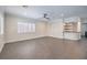 Gathering room with wet bar, built-in shelving, and tile flooring at 5423 San Florentine Ave, Las Vegas, NV 89141