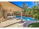 Inviting backyard with covered patio and pool at 5423 San Florentine Ave, Las Vegas, NV 89141