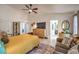 Main bedroom with ensuite bathroom and sitting area at 5604 Ocean Pines Cir, Las Vegas, NV 89130