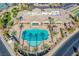 Community pool with surrounding lounge area at 5944 Saddle Horse Ave, Las Vegas, NV 89122