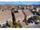 Aerial view of house and neighborhood, showcasing surrounding homes and landscape at 5956 Lambert Bridge Ave, Las Vegas, NV 89139