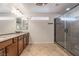 Primary bathroom with double vanity and large shower at 5956 Lambert Bridge Ave, Las Vegas, NV 89139