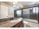 Bathroom includes a single sink vanity and shower/tub combo at 5956 Lambert Bridge Ave, Las Vegas, NV 89139