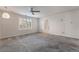 Spacious bedroom with ceiling fan and carpet at 5956 Lambert Bridge Ave, Las Vegas, NV 89139
