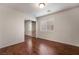 Bedroom with mirrored closet doors and hardwood floors at 5956 Lambert Bridge Ave, Las Vegas, NV 89139
