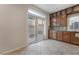 Kitchen with sliding door leading to the backyard at 5956 Lambert Bridge Ave, Las Vegas, NV 89139