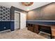 Bright office with a closet and L-shaped desk at 5956 Lambert Bridge Ave, Las Vegas, NV 89139