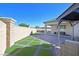 Serene backyard with a gazebo, patio, and artificial turf at 6160 Lautman Ridge Ct, Las Vegas, NV 89141