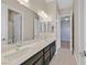 Bathroom with double vanity and dark brown cabinets at 6160 Lautman Ridge Ct, Las Vegas, NV 89141