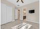 Bedroom with white doors and en-suite bathroom at 6160 Lautman Ridge Ct, Las Vegas, NV 89141