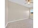 Bright bedroom with herringbone floors and ceiling fan at 6160 Lautman Ridge Ct, Las Vegas, NV 89141