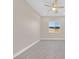 Bright bedroom with herringbone floors and ceiling fan at 6160 Lautman Ridge Ct, Las Vegas, NV 89141