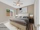 Virtually staged main bedroom with accent wall at 6160 Lautman Ridge Ct, Las Vegas, NV 89141