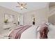 Virtually staged main bedroom with ensuite bathroom at 6160 Lautman Ridge Ct, Las Vegas, NV 89141