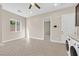 Spacious bonus room with herringbone floors and access to garage at 6160 Lautman Ridge Ct, Las Vegas, NV 89141