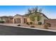Single-story house with a two-car garage and nicely landscaped front yard at 6160 Lautman Ridge Ct, Las Vegas, NV 89141