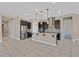 Modern kitchen with dark cabinetry, stainless steel appliances, and granite countertops at 6160 Lautman Ridge Ct, Las Vegas, NV 89141