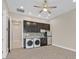 Laundry room with kitchenette and additional storage at 6160 Lautman Ridge Ct, Las Vegas, NV 89141