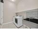 Laundry room with washer, dryer and utility sink at 6160 Lautman Ridge Ct, Las Vegas, NV 89141