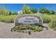 Sign for Inzalaco Gathering Park, landscaped with flowers at 6160 Lautman Ridge Ct, Las Vegas, NV 89141