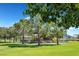 Colorful playground equipment in a park setting at 6160 Lautman Ridge Ct, Las Vegas, NV 89141