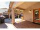 Covered patio with access to the backyard and detached garage at 6349 Heather Creek Place Pl, Las Vegas, NV 89122