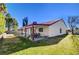 Inviting backyard with covered patio and grassy area at 6466 Scotch Pine Cir, Las Vegas, NV 89146