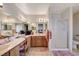 Large bathroom with double vanity and shower at 6466 Scotch Pine Cir, Las Vegas, NV 89146