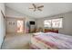 Bedroom with queen-size bed and ensuite bathroom at 6466 Scotch Pine Cir, Las Vegas, NV 89146