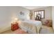 Cozy bedroom with floral bedding and wood furniture at 6466 Scotch Pine Cir, Las Vegas, NV 89146