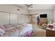 Bedroom with queen-size bed and ceiling fan at 6466 Scotch Pine Cir, Las Vegas, NV 89146