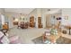 Open concept dining area with a view of the kitchen and living room at 6466 Scotch Pine Cir, Las Vegas, NV 89146